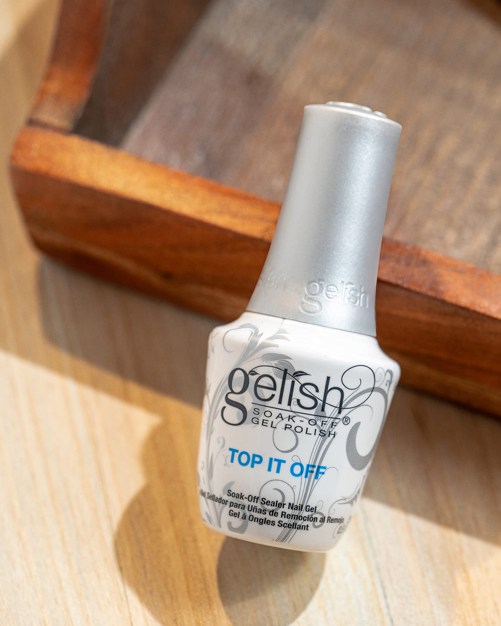 Gelish Top It Off brush close-up displaying smooth application benefit