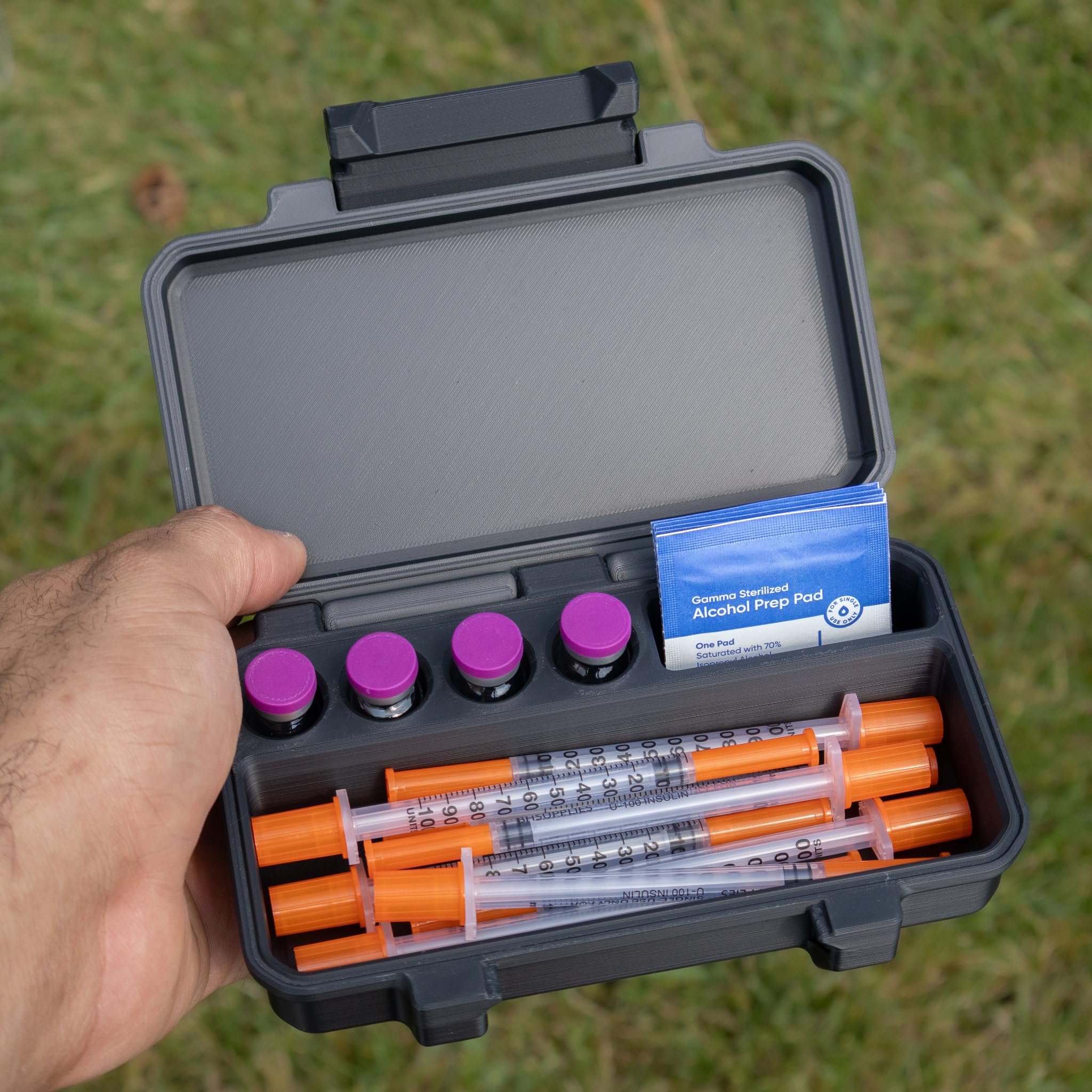 Generic brand close-up of wide 6-inch syringe compartment for secure storage