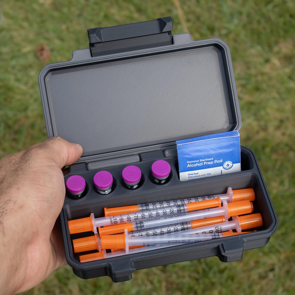 Generic brand close-up of wide 6-inch syringe compartment for secure storage