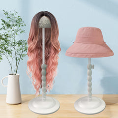 Generic wig stand base closeup highlighting widened base for non‑slip stability