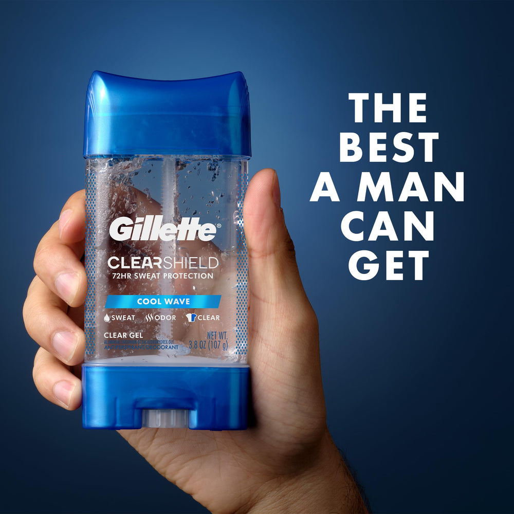 Gillette clear gel held in hand to show 3.8 oz size and portability