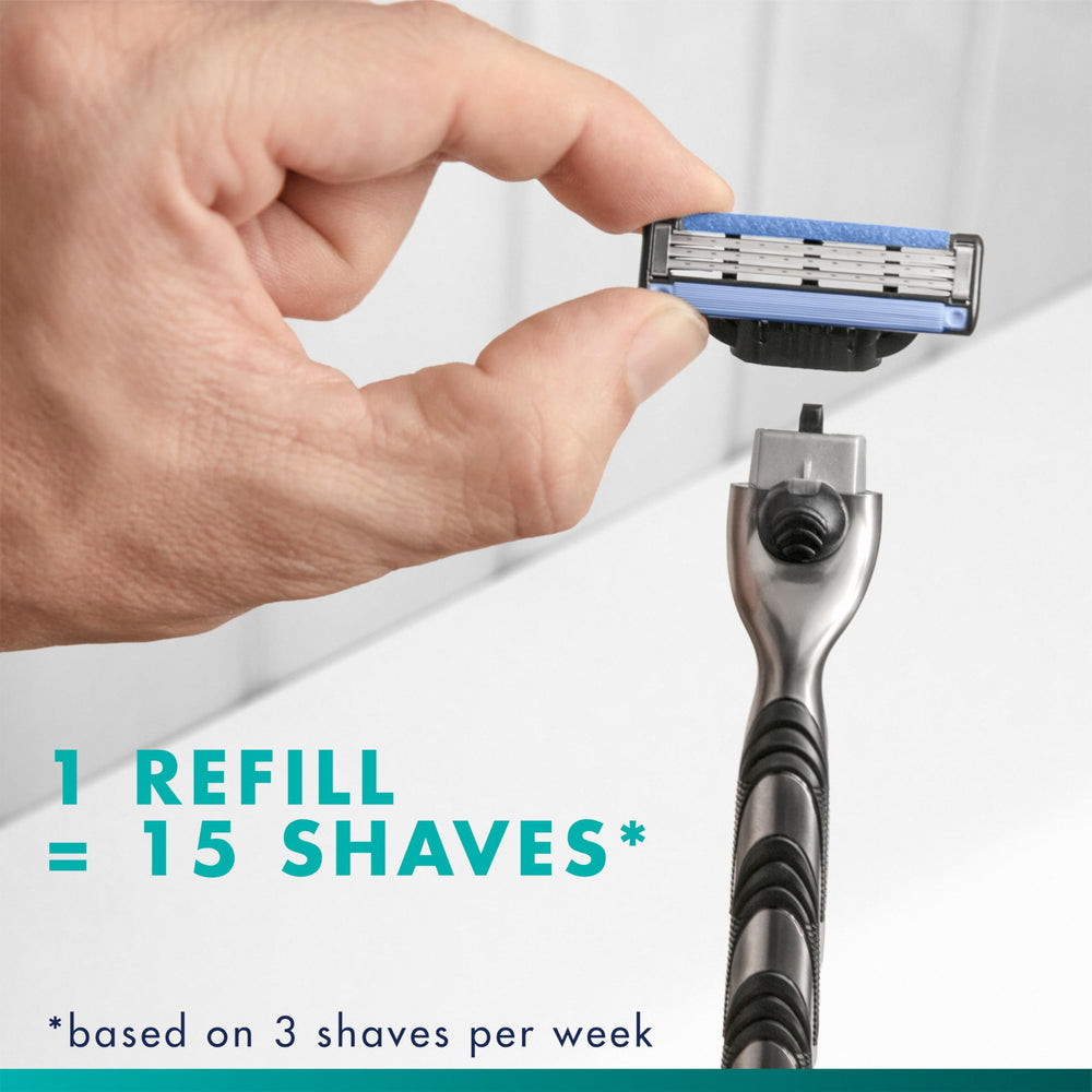 Gillette Mach3 next to ruler for scale to show compact cartridge size