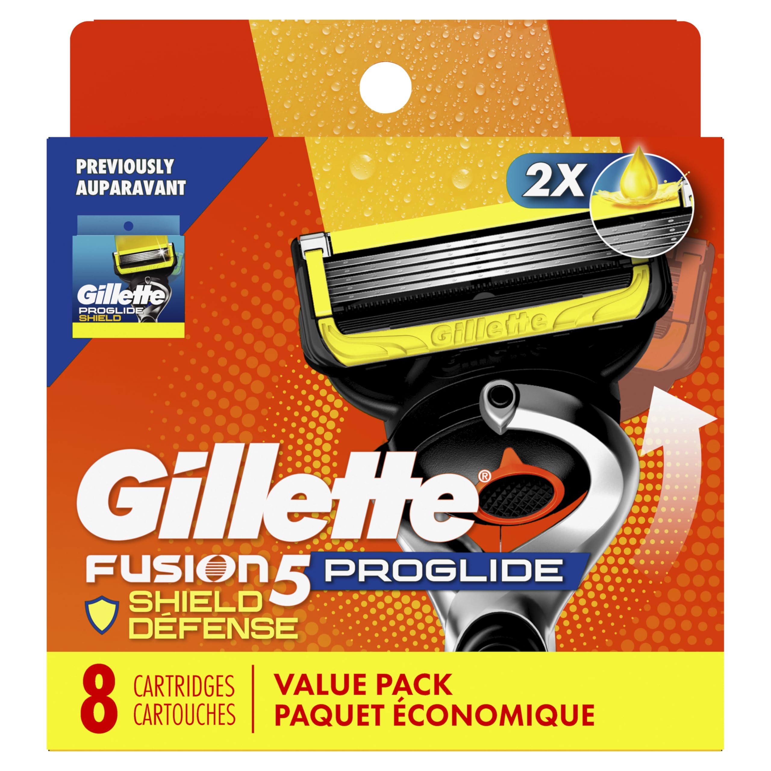 Gillette cartridge next to coin for size comparison showing compact, travel-friendly design