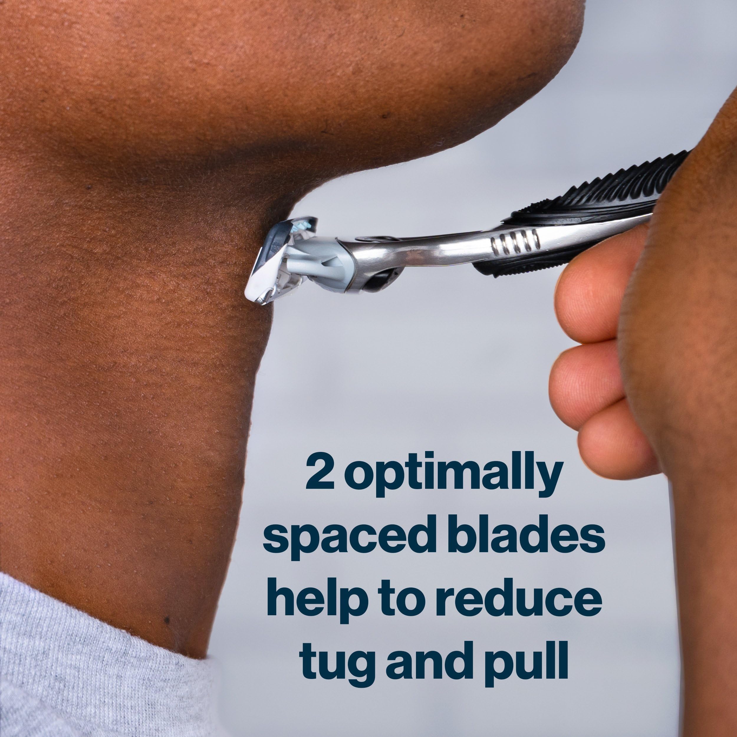 Gillette SkinGuard cartridge mounted on handle demonstrating easy swap and secure fit