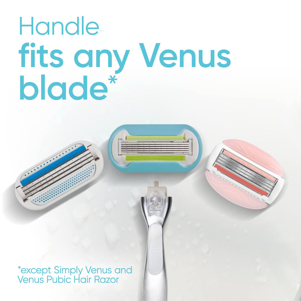 Hand holding Gillette Venus razor for scale showing comfortable, weighted balance