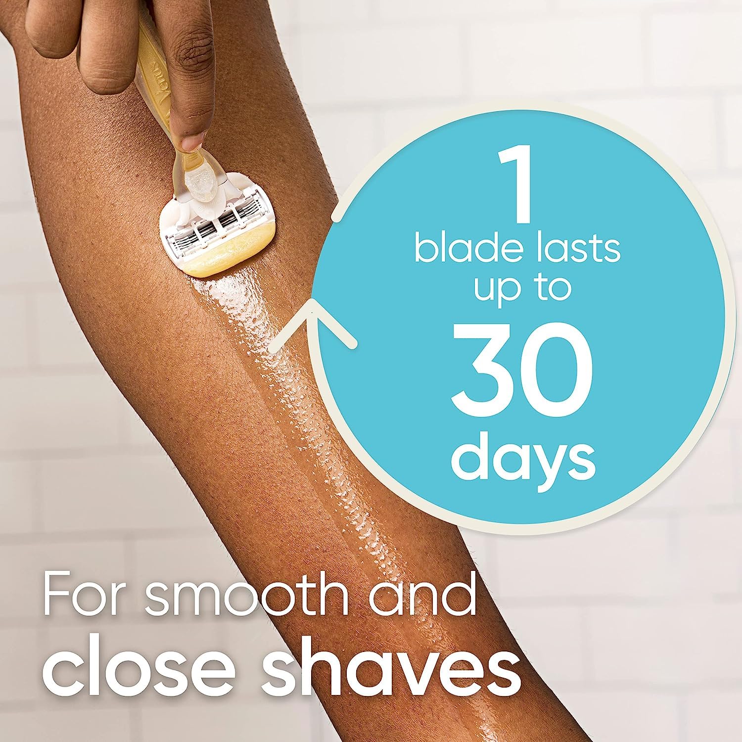 Gillette Venus razor in hand shaving leg for precise contour follow
