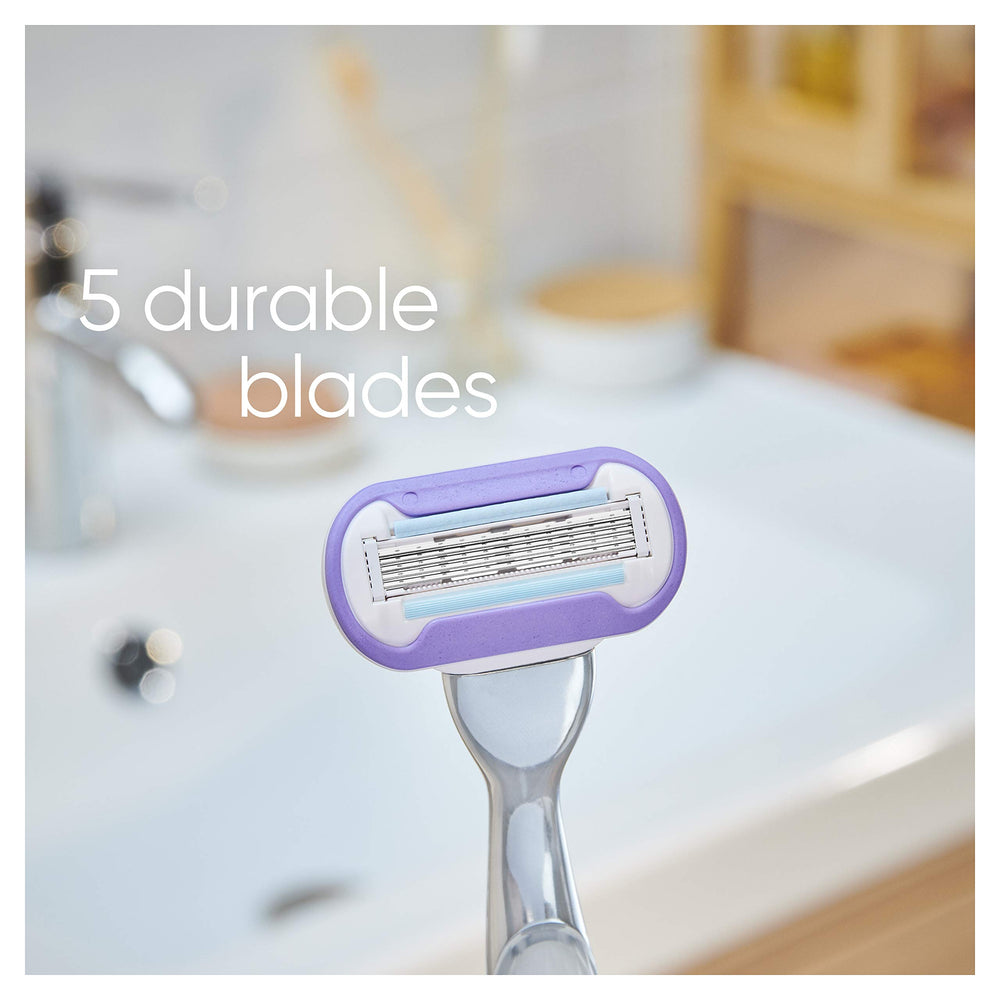 Gillette Venus metal handle close-up showing ergonomic grip and control