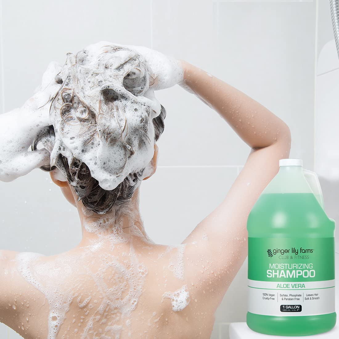 Ginger Lily Farms shampoo in shower scene conveying refreshing cleanse