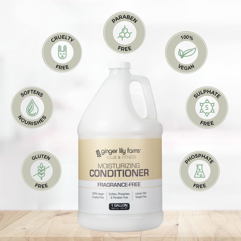 Shower dispenser in gym locker room filled with Ginger Lily Farms conditioner