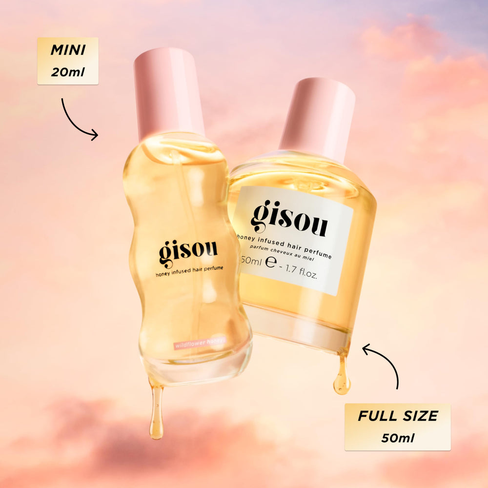 Model applying Gisou mist to hair showing improved shine and softer look