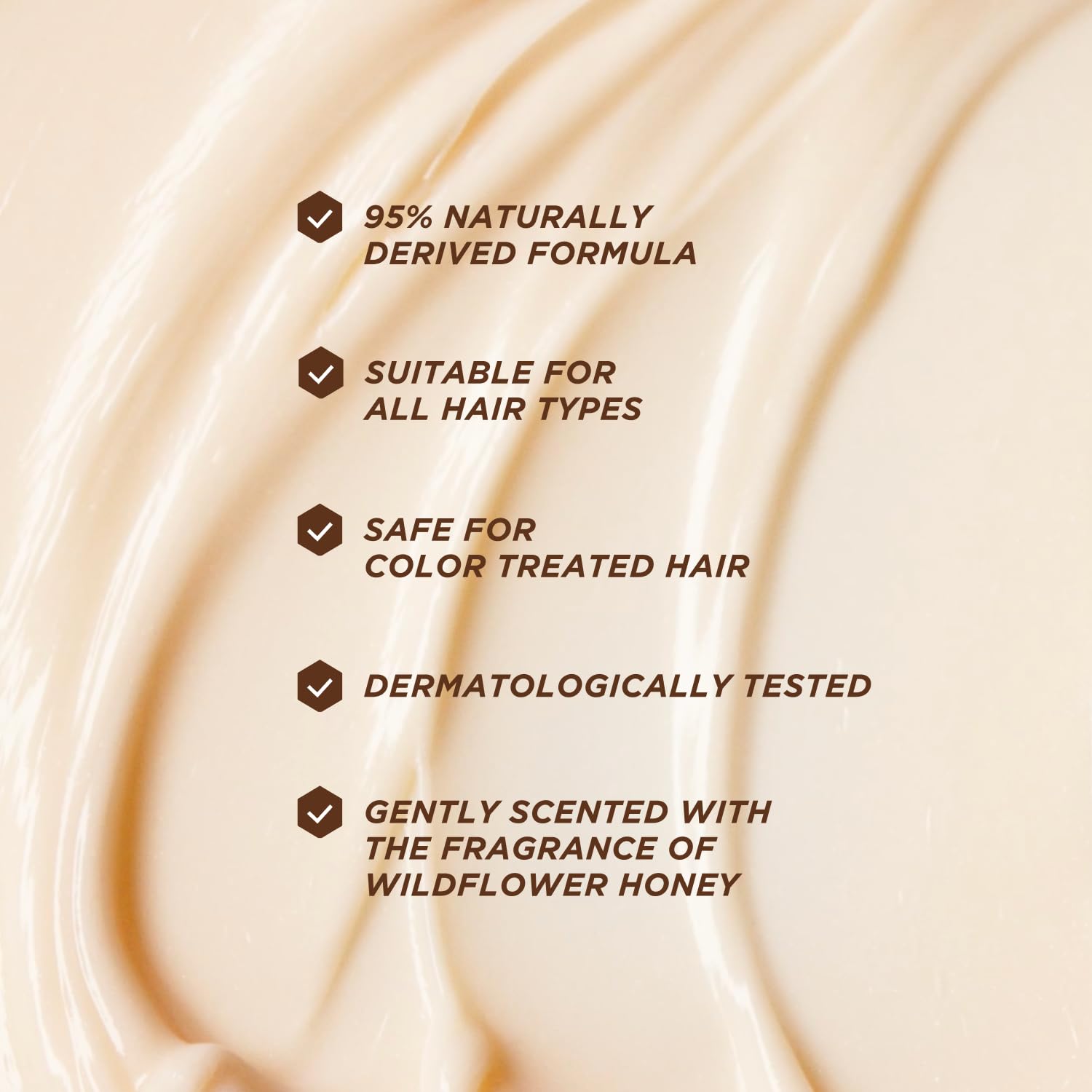 Gisou texture on hand demonstrating creamy conditioner slip for smoother detangling