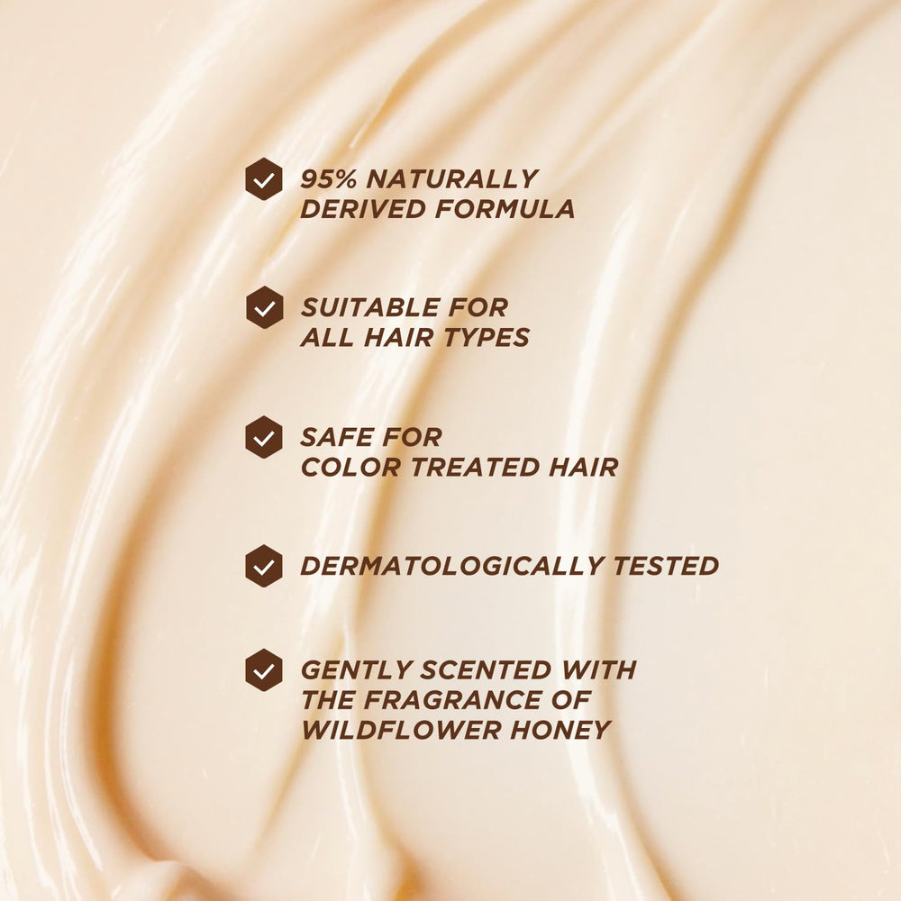 Gisou texture on hand demonstrating creamy conditioner slip for smoother detangling