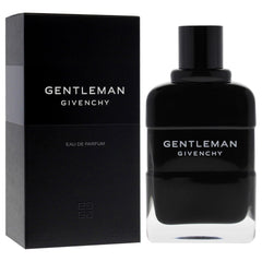 Givenchy bottle being sprayed on wrist demonstrating wearable intensity