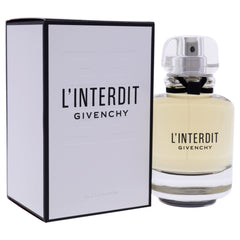 Givenchy L'Interdit spray applied to skin close-up, demonstrating scent application benefit
