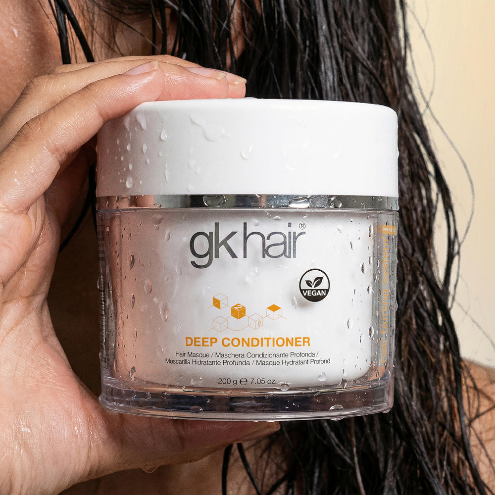 GK HAIR 7.05 oz jar next to ruler showing true size
