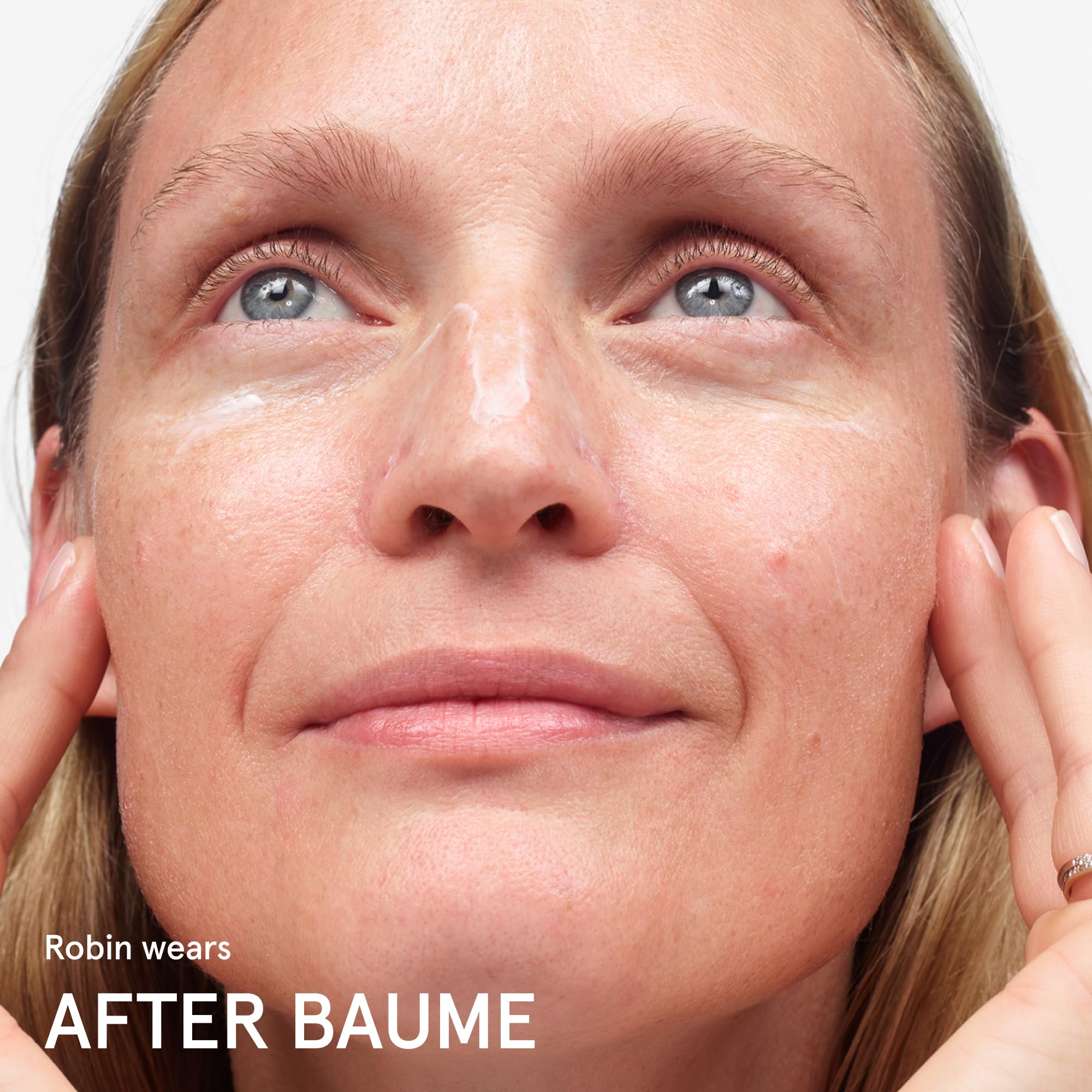 Glossier After Baume next to coin for size scale and travel-ready benefit