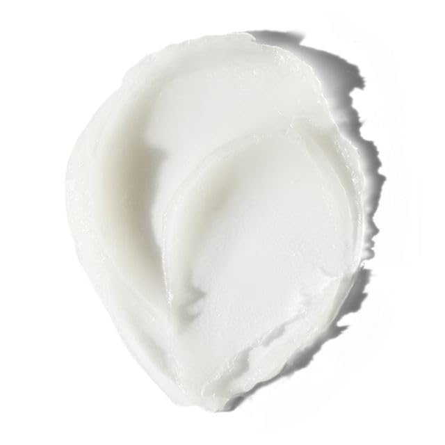 Glossier balm dotcom coconut lifestyle outdoor shot conveying fresh coconut scent