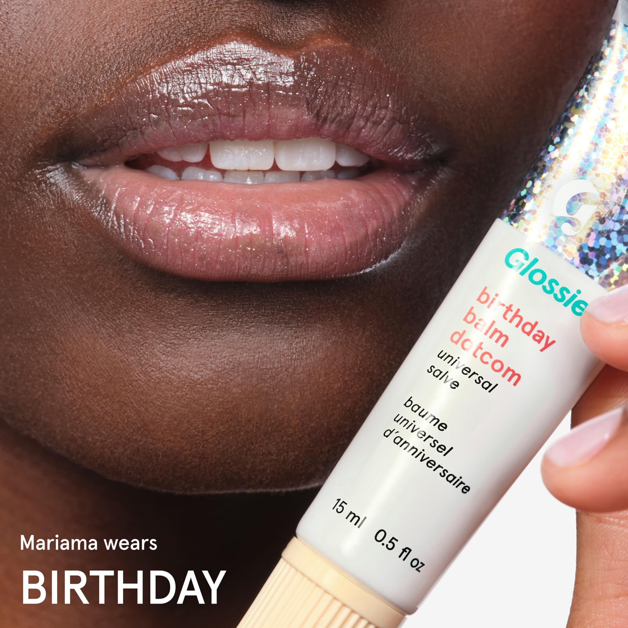 Glossier Balm Dotcom on cuticles demonstrating multi‑use moisturizing benefit