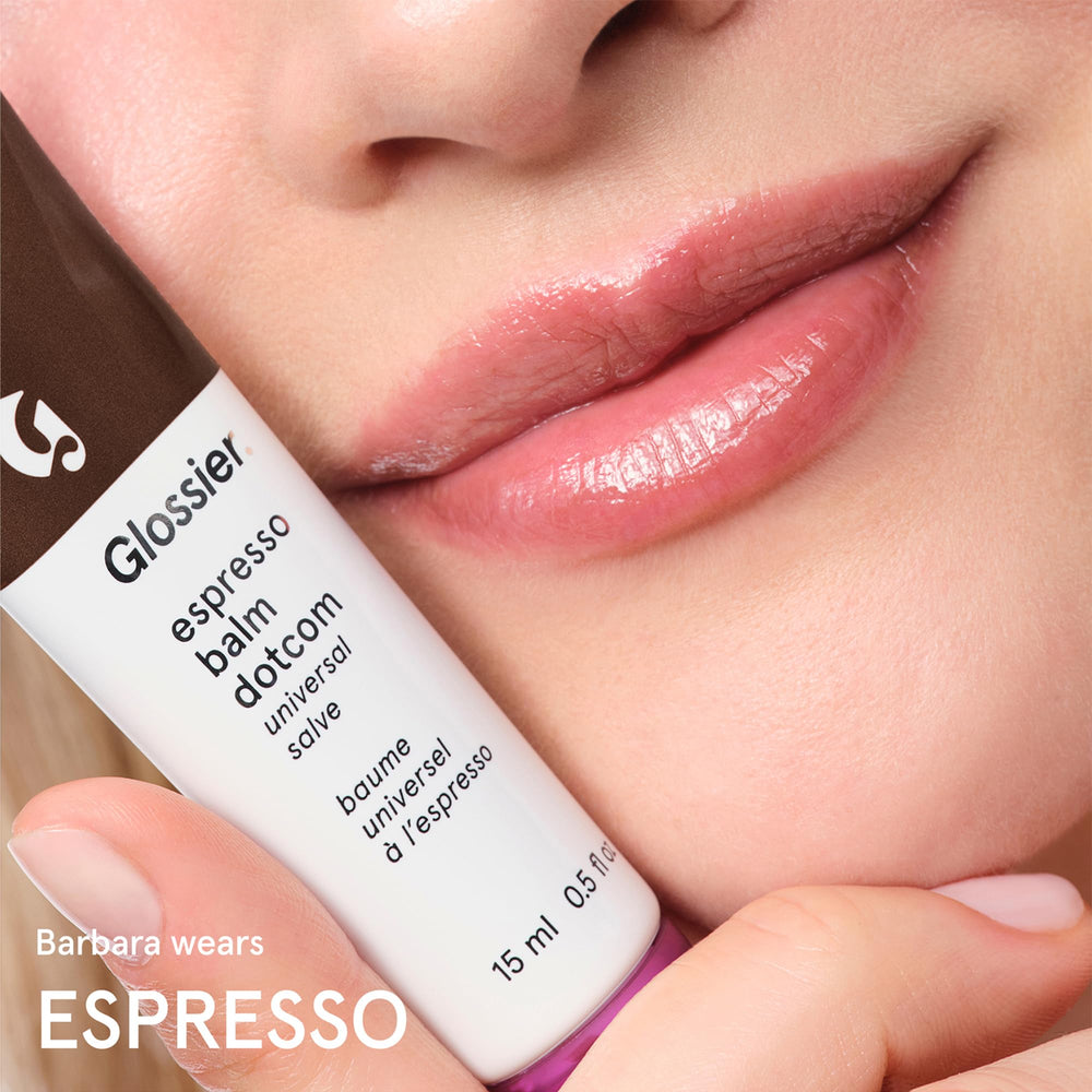 Glossier balm smoothed on elbow demonstrating barrier protection and dryness relief