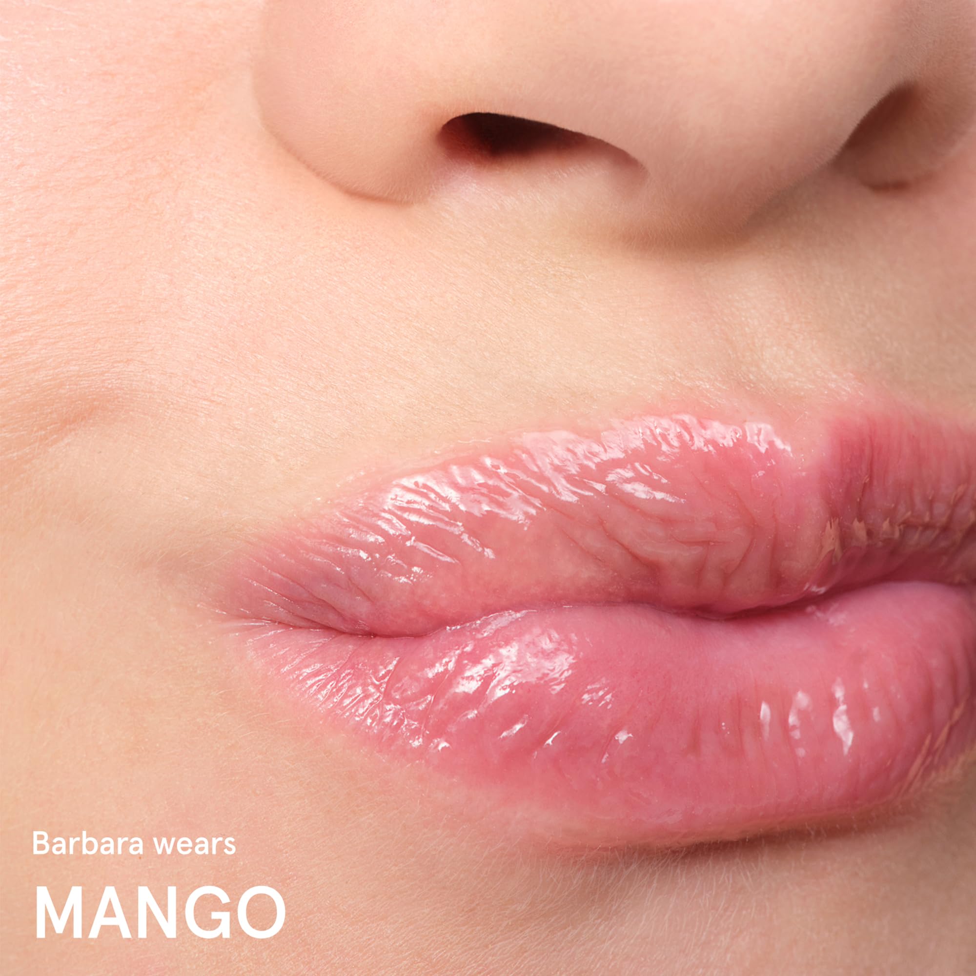 Glossier Balm Dotcom mango ingredients label showing beeswax lanolin castor oil