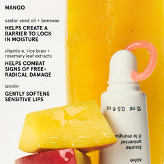 Glossier Balm Dotcom mango peach tint on lips showing natural subtle color boost