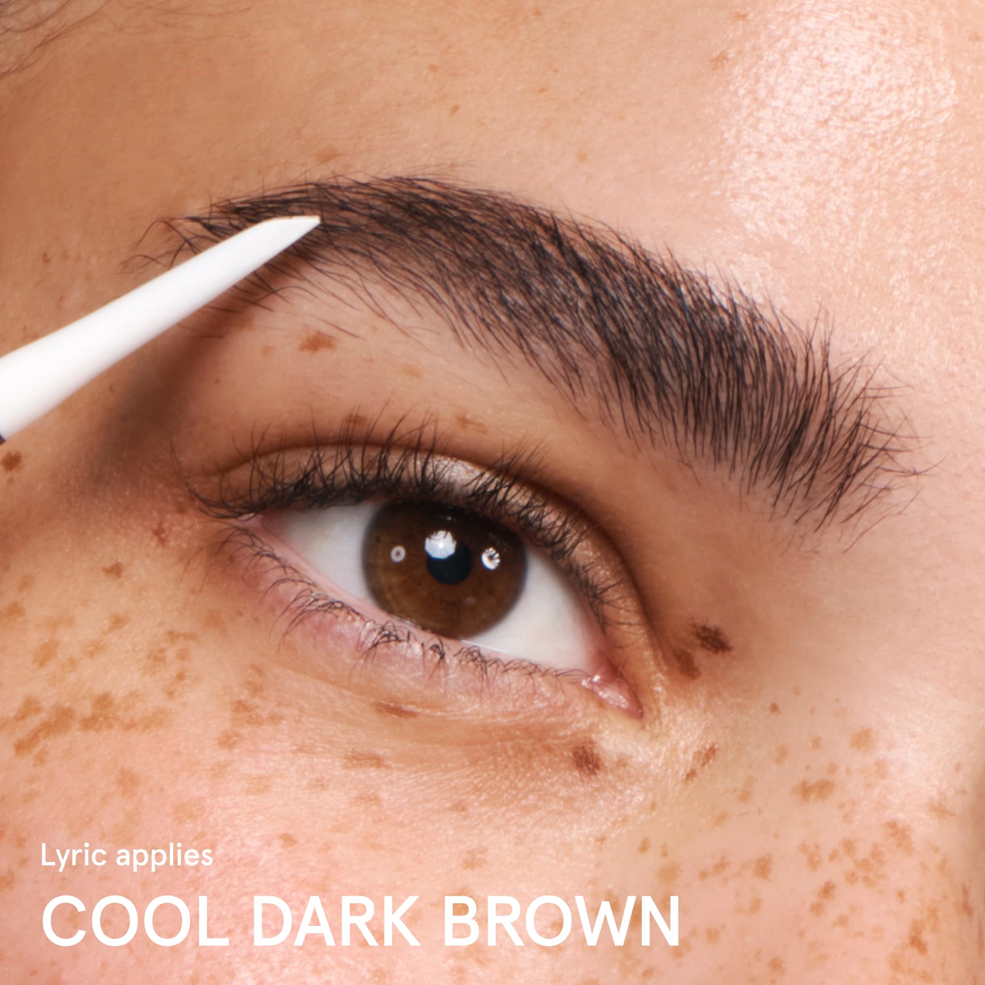 Glossier Boy Brow Arch tube label showing Cool Dark Brown shade for cool-toned brows