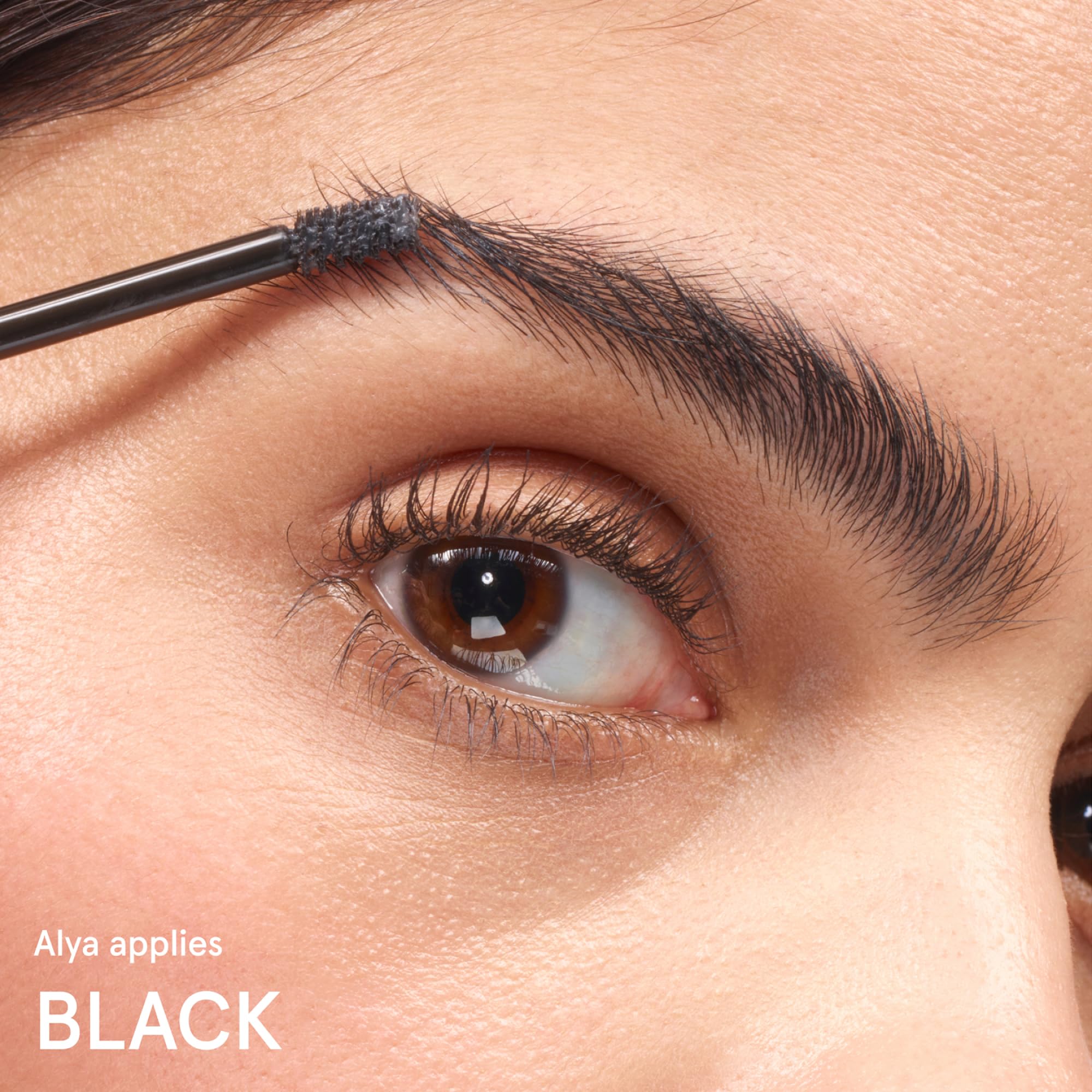 Glossier Boy Brow on bathroom shelf in lifestyle setting for seamless routine integration