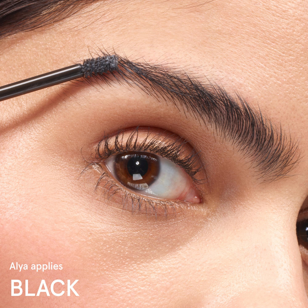 Glossier Boy Brow on bathroom shelf in lifestyle setting for seamless routine integration