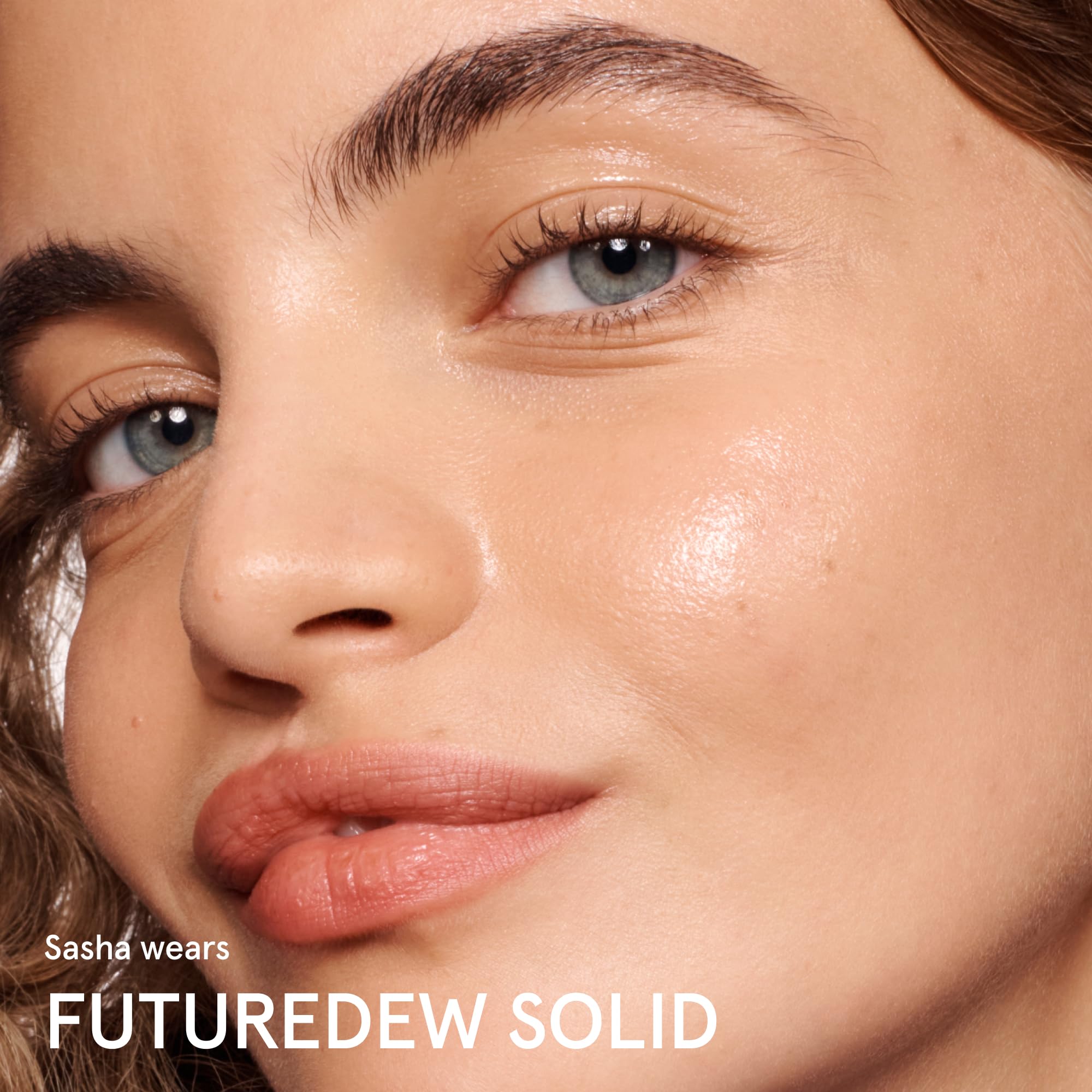 Glossier Futuredew solid on dressing table styling with other Glossier items