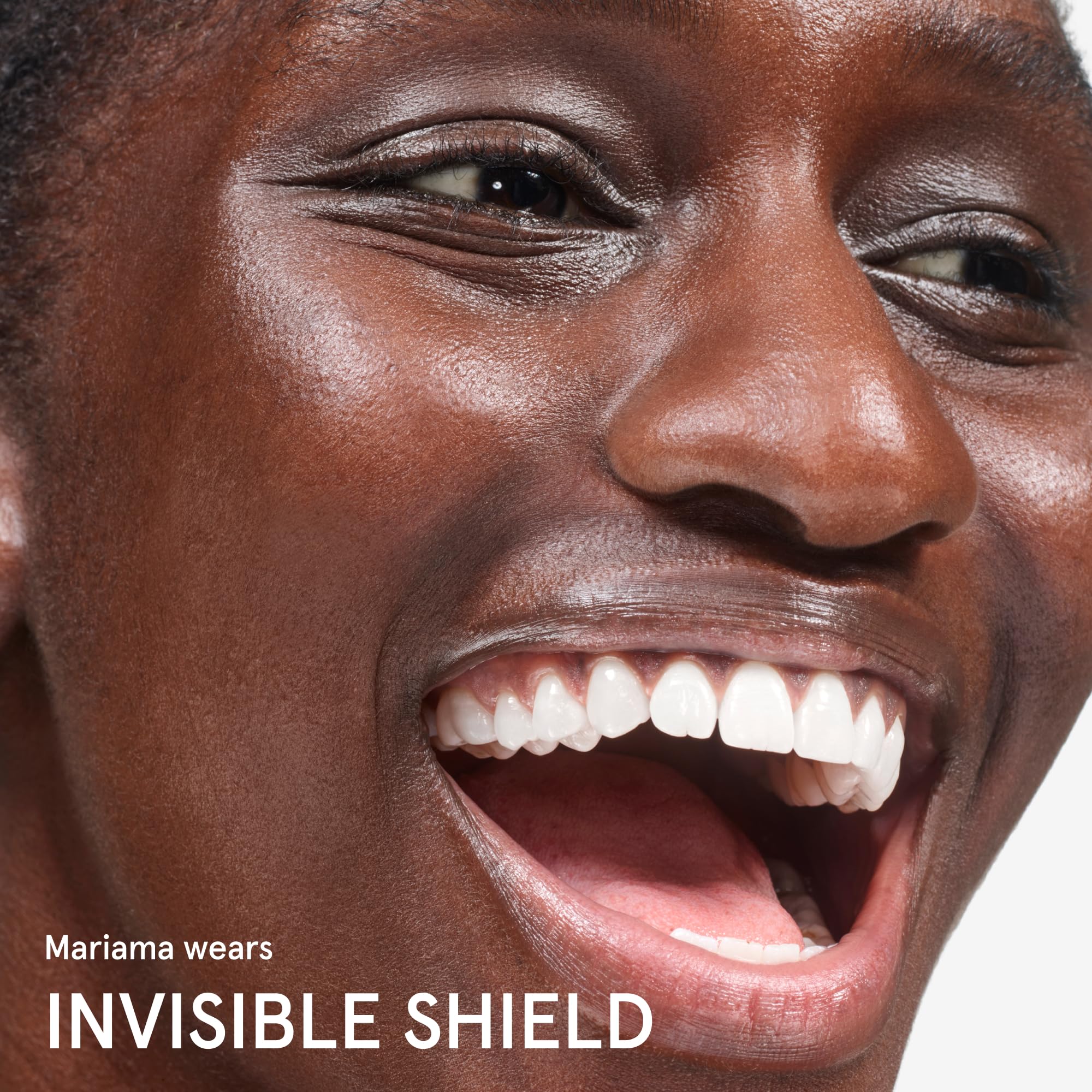 Glossier Invisible Shield ingredients label close-up highlighting rice phyto-compounds and aloe benefit: antioxidant support