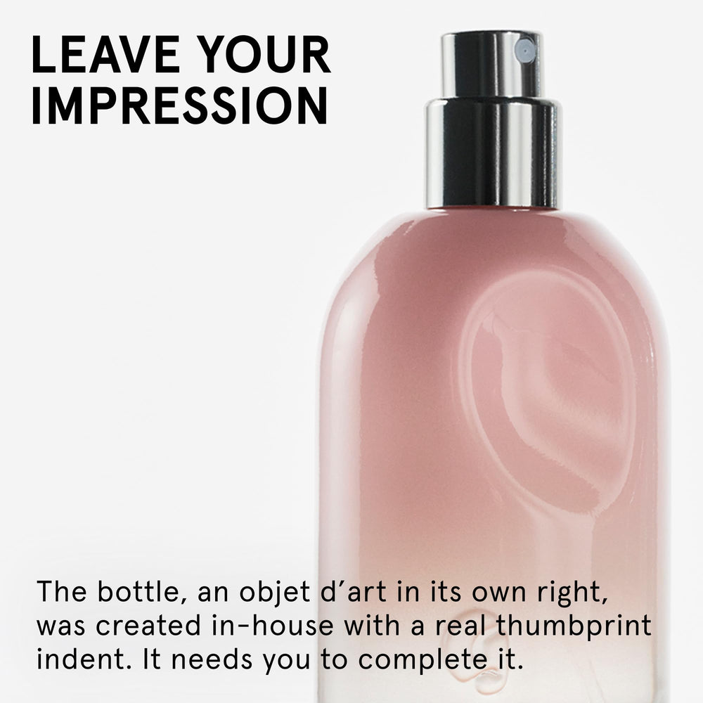 Glossier You held in hand to show 50 ml size and travel-friendly convenience