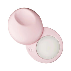Glossier compact front view showing sleek metal case and branding benefit: travel-ready