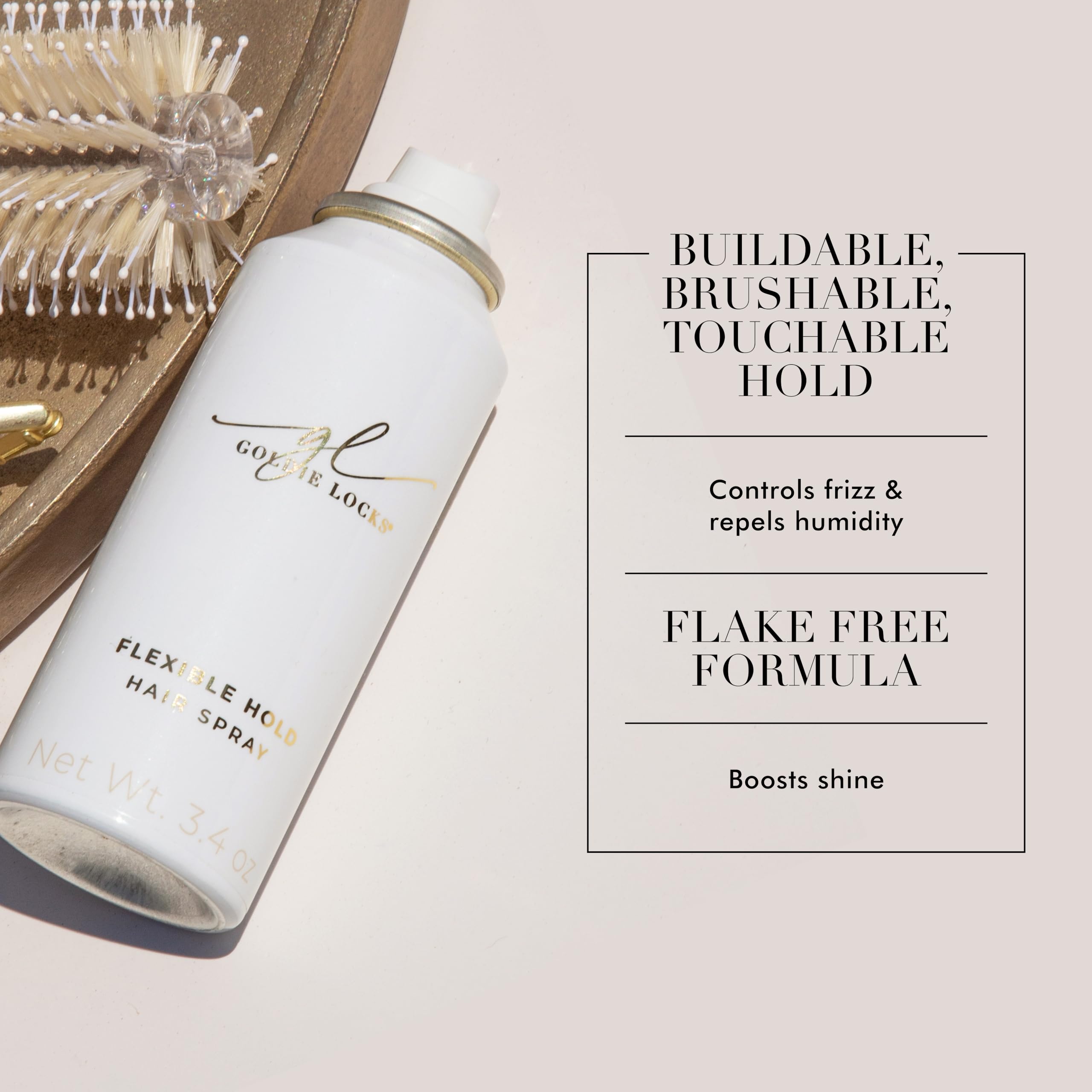 Goldie Locks bottle in hand showing 9 oz size and travel-friendly convenience