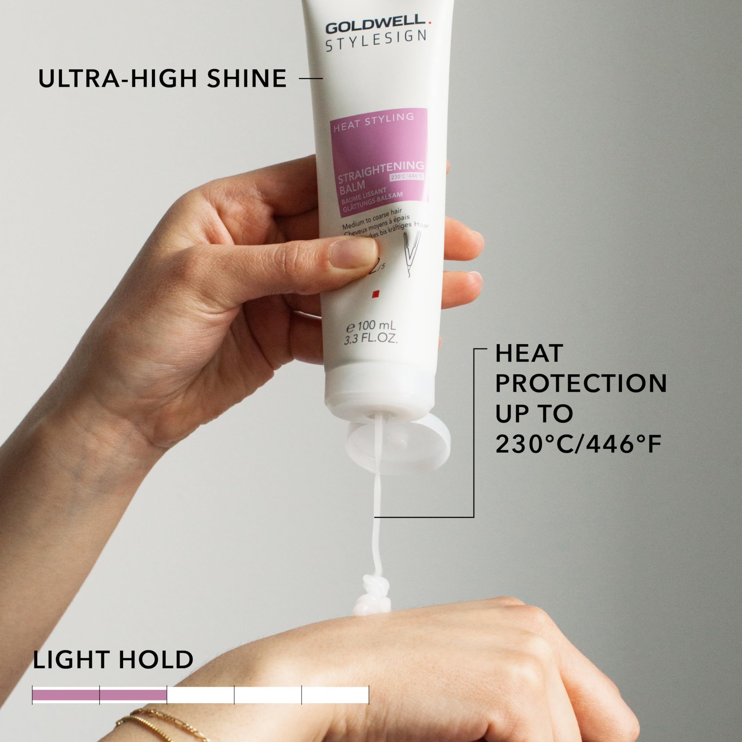 Goldwell being applied to towel-dried hair for protection