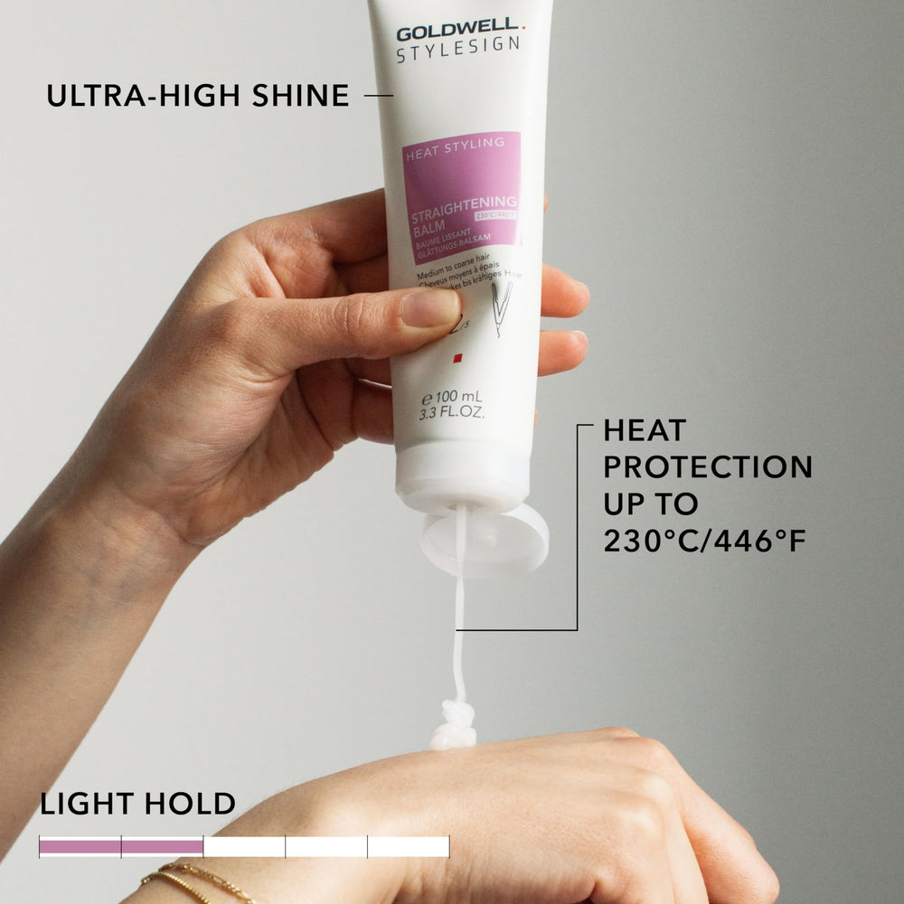 Goldwell being applied to towel-dried hair for protection