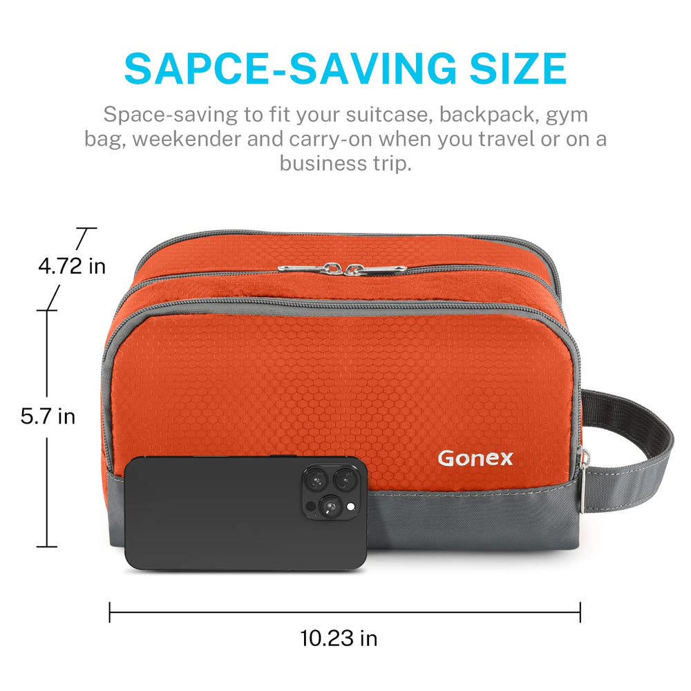 Gonex next to a duffel to show compact size and packing ease