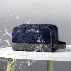 Gonex toiletry bag open revealing main compartment and zippered mesh pouch for visibility