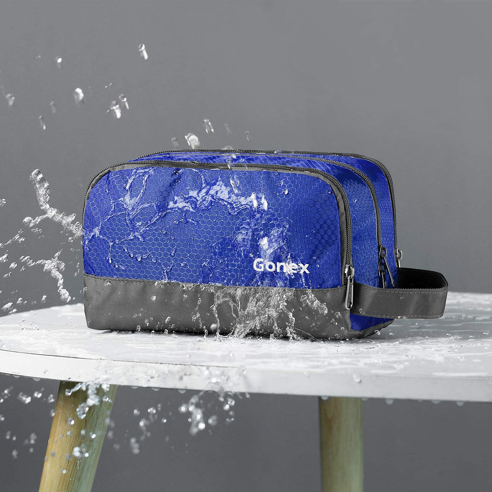 Gonex open main compartment holding bottles and grooming items for organization