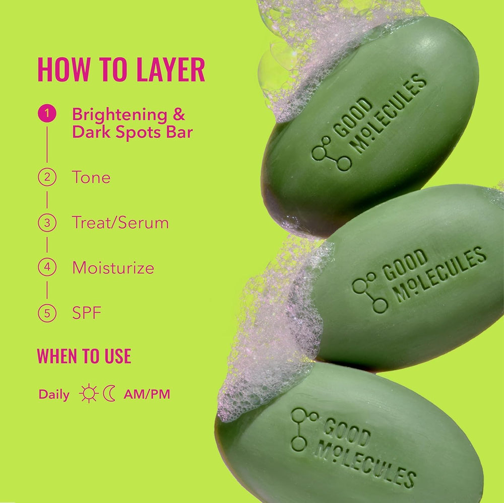 Good Molecules applying bar lather to face for targeted brightening