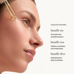 goop nutrient face oil dropper releasing golden droplet, precise application and control
