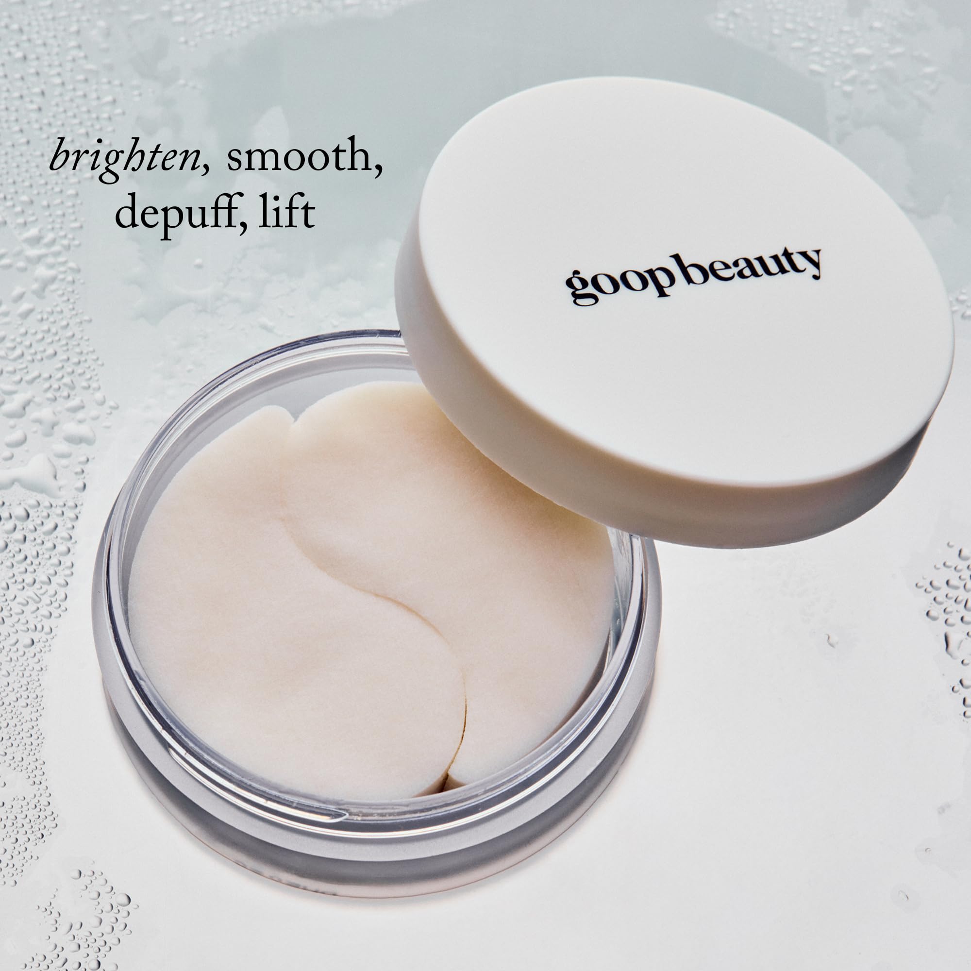 goop milky serum drop on fingertip showing concentrated active delivery