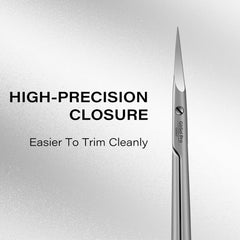 GÖSOL scissors held in hand showing scale and comfortable control for detailed work