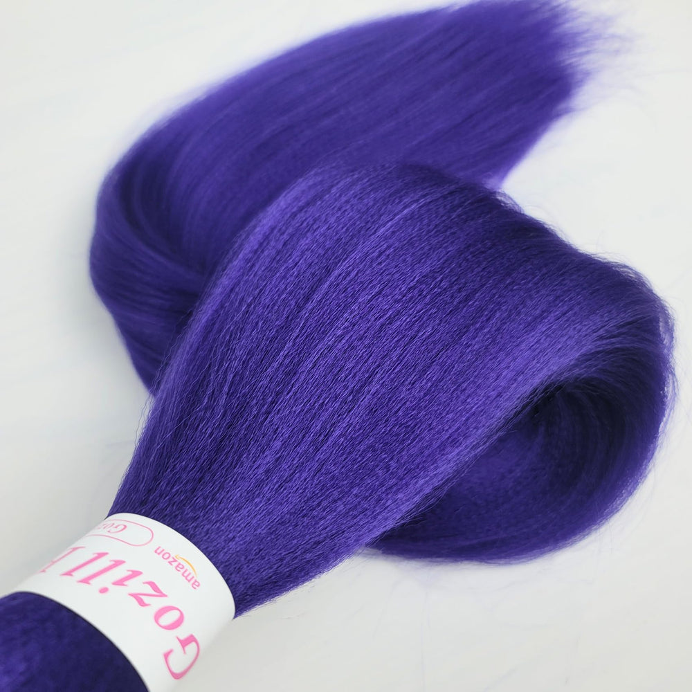 Gozill hair beside a ruler showing length scale and easy-to-handle weight benefit
