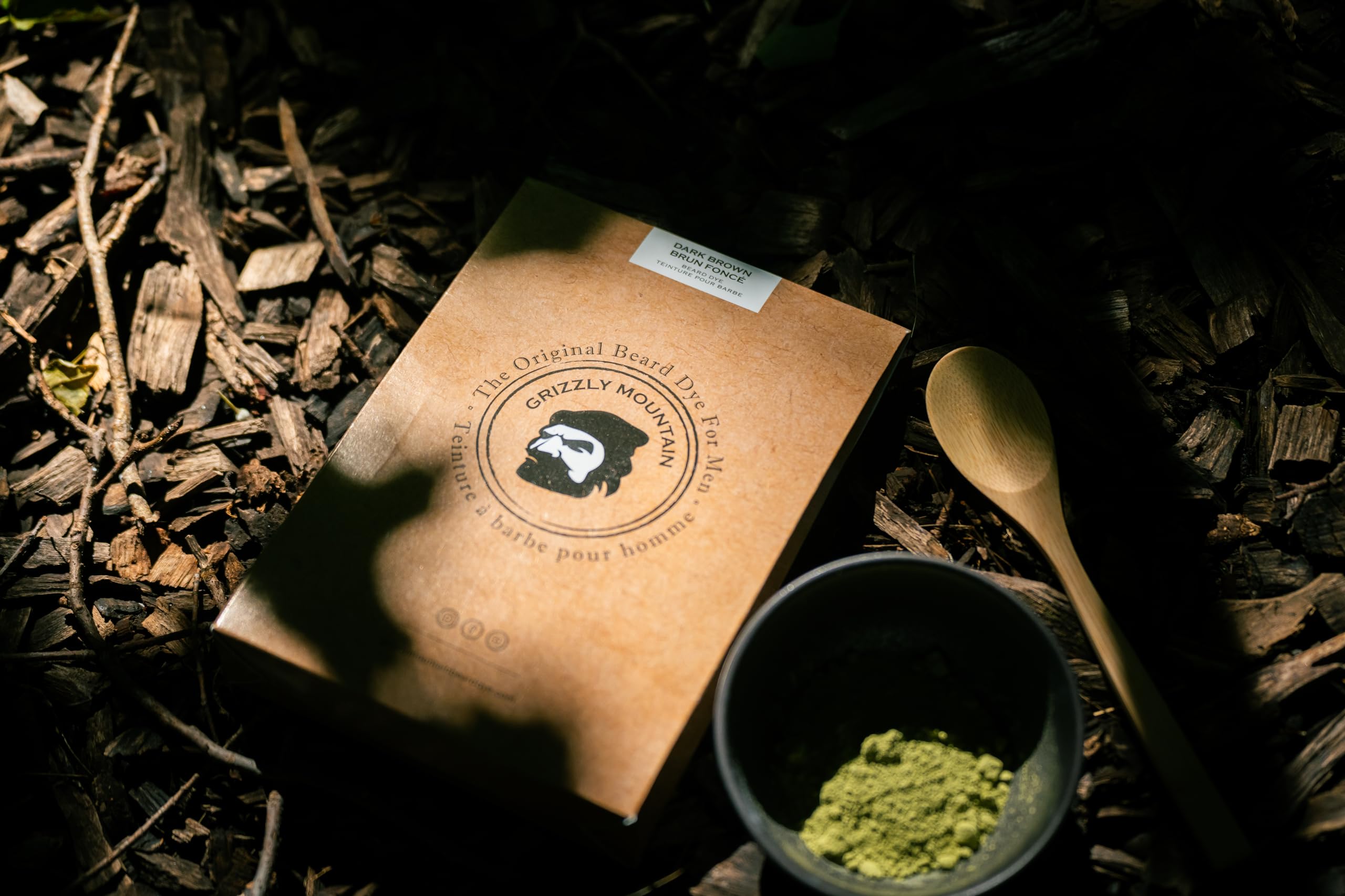 Label close-up listing botanicals on Grizzly Mountain beard dye for ingredient transparency