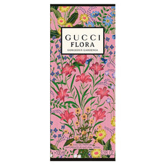Person wearing Gucci Flora perfume outdoors, conveys fresh floral confidence