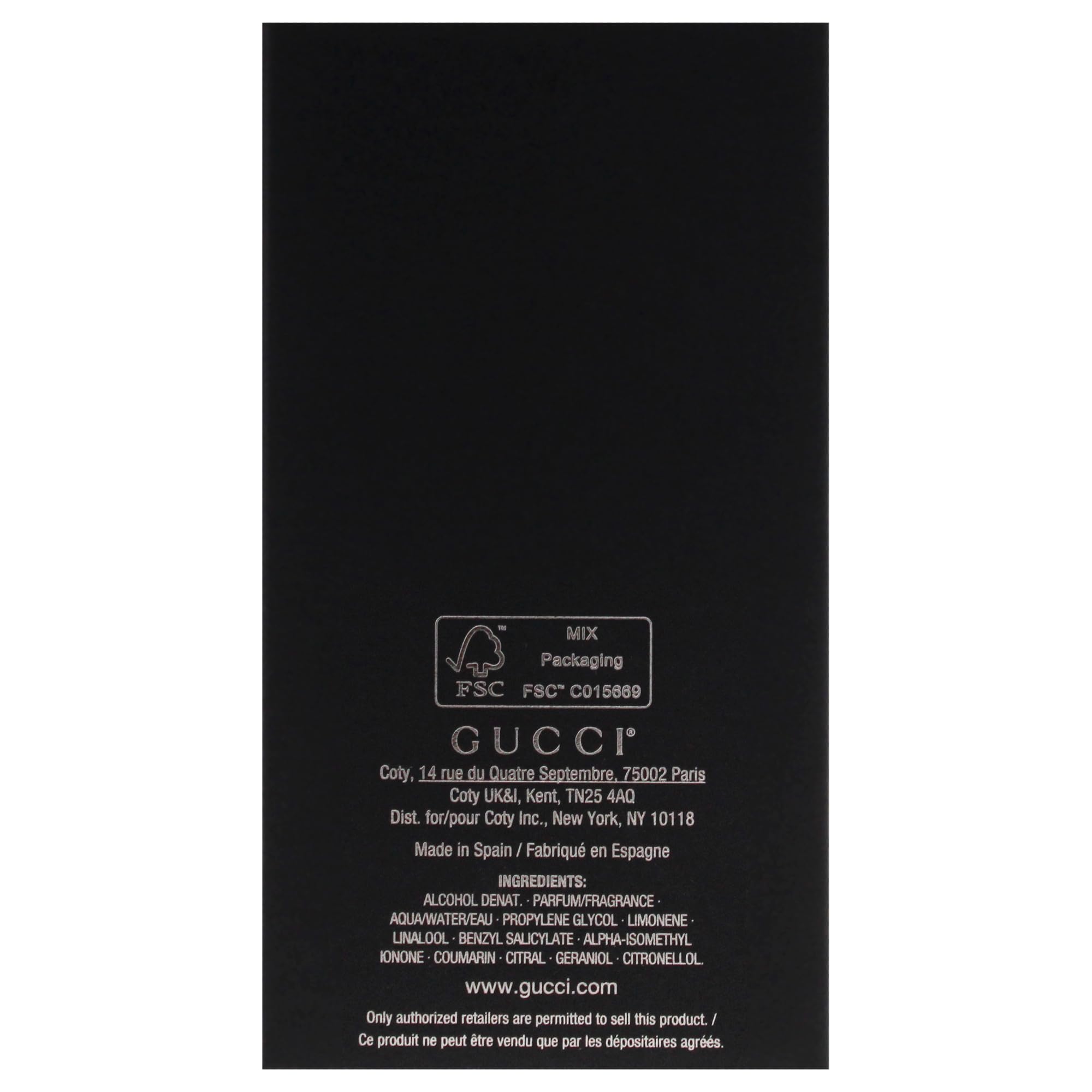 Gucci 3 oz bottle next to everyday objects for size comparison