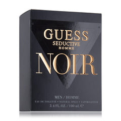 GUESS Seductive Noir 3.4 oz bottle next to ruler for size and portability reference