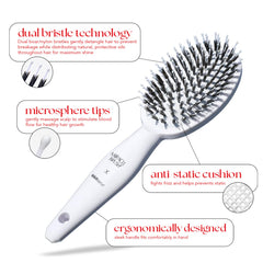HAIRtamin brush in use while blow-drying to smooth hair and speed drying benefit