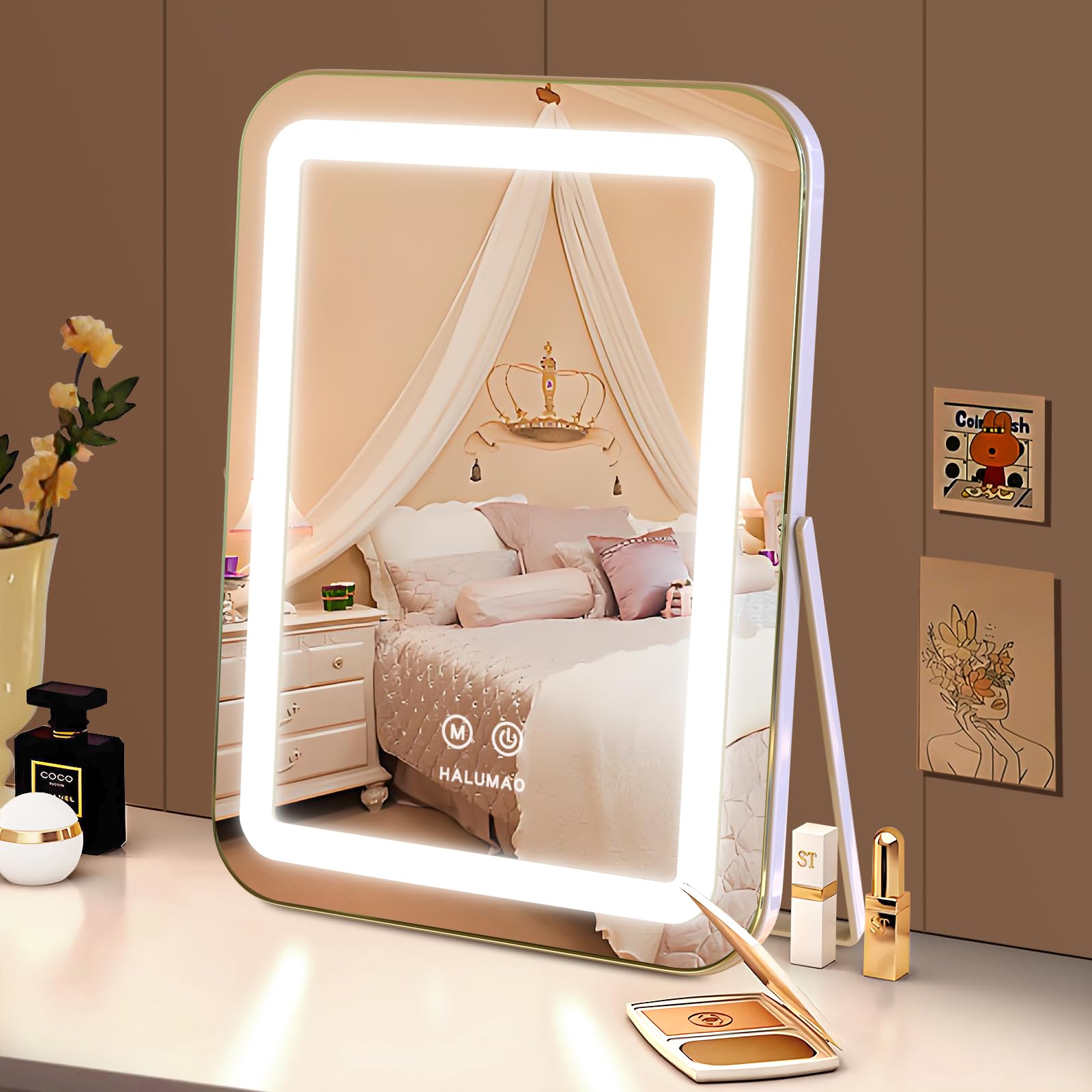 halumao mirror next to hand for size comparison showing compact footprint benefit