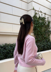Hana Mia clip securing a half-up hairstyle, fast polished styling